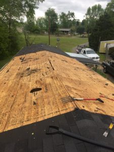 PI Roofing removes damaged residential roof in Little Rock