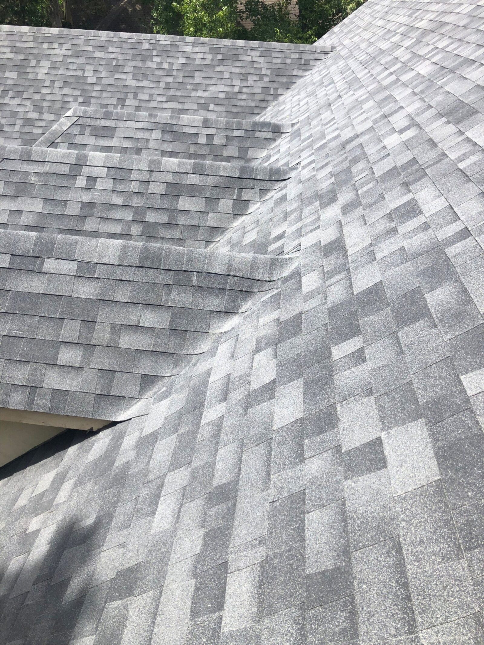 A close-up of a complete reroof done in Little Rock with asphalt shingles